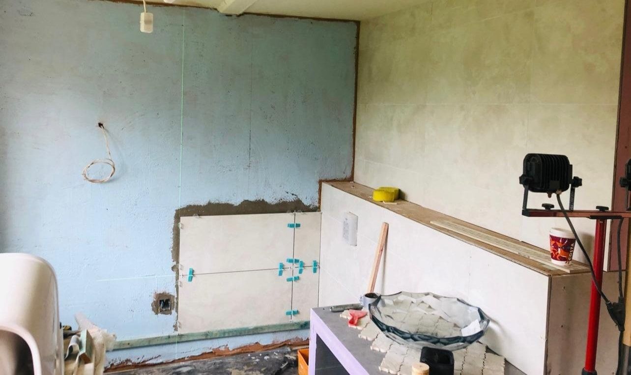Bathroom walls prepared for tiling during renovation
