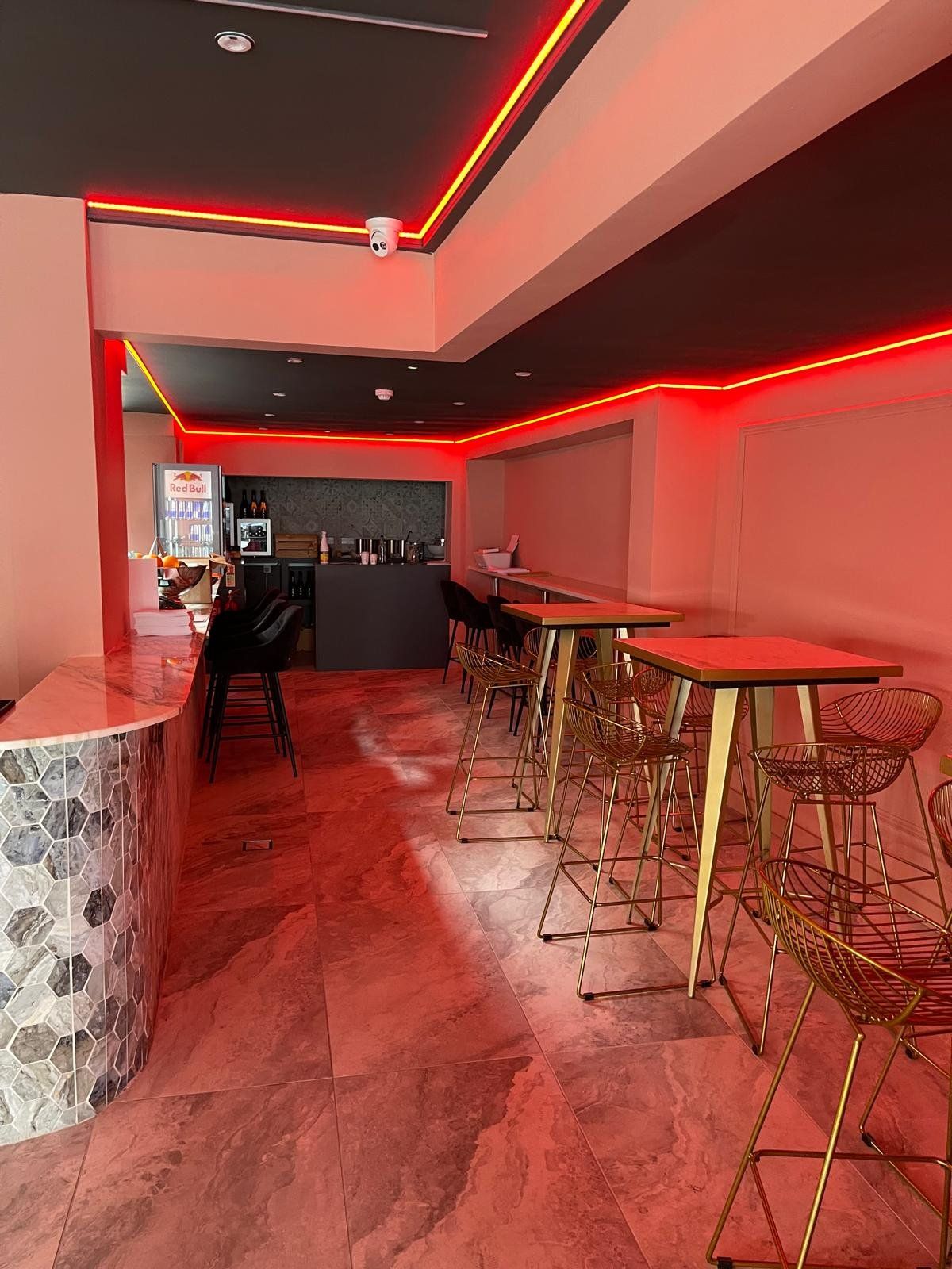 Bar interior with red neon lighting
