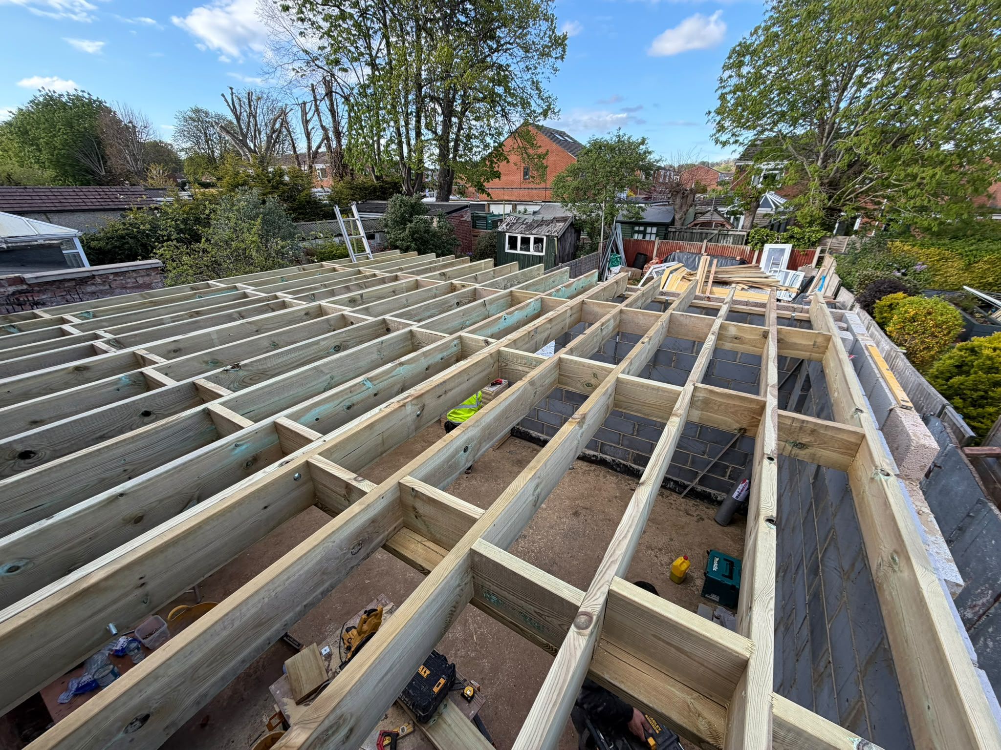 Timber joists forming a flat-roof extension