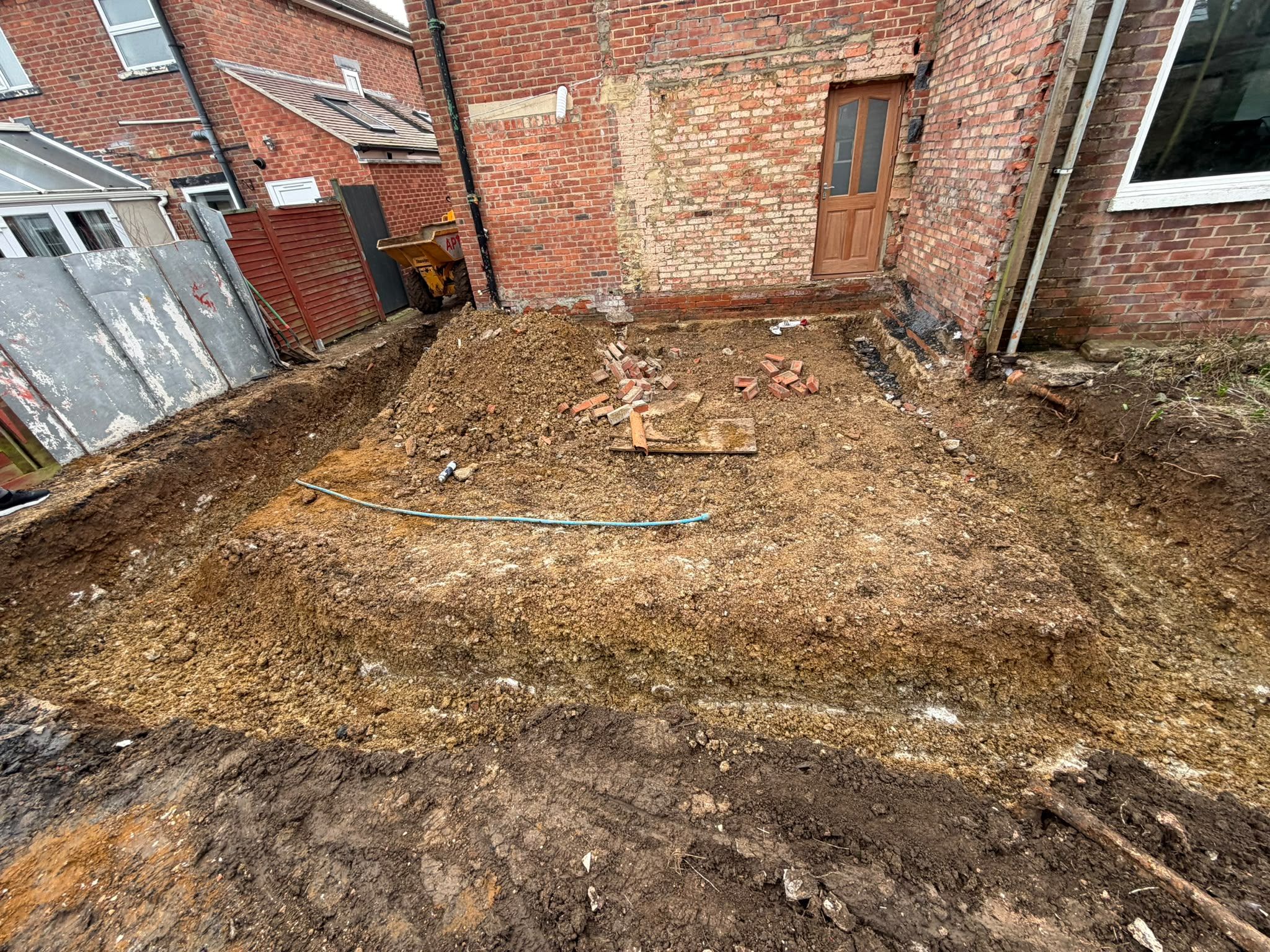 Ground dug out for the foundations of a rear extension