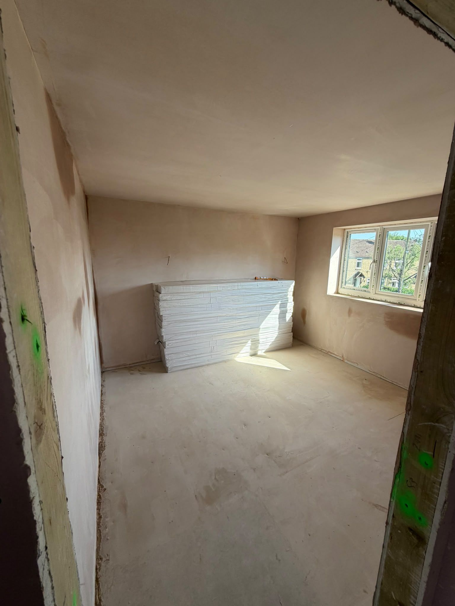 Freshly plastered room ready for the next stage