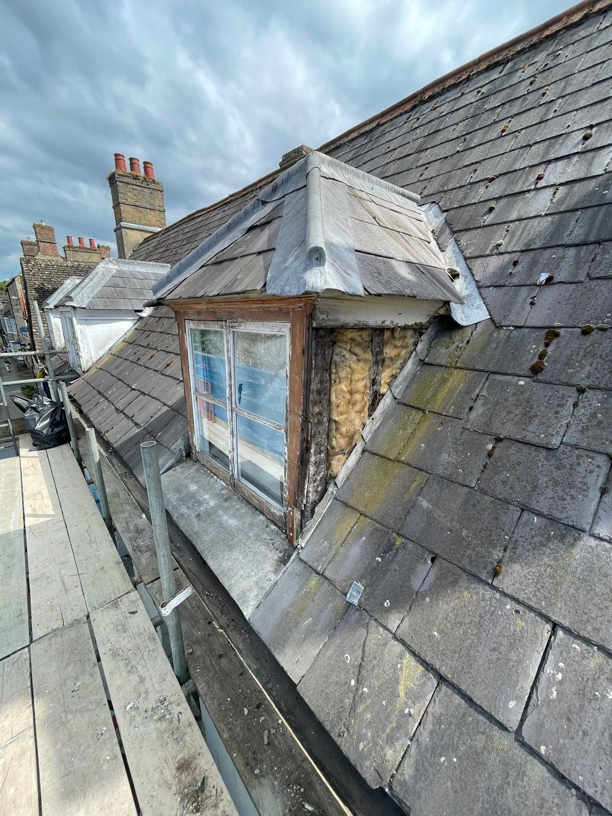 Roof dormer window before repair