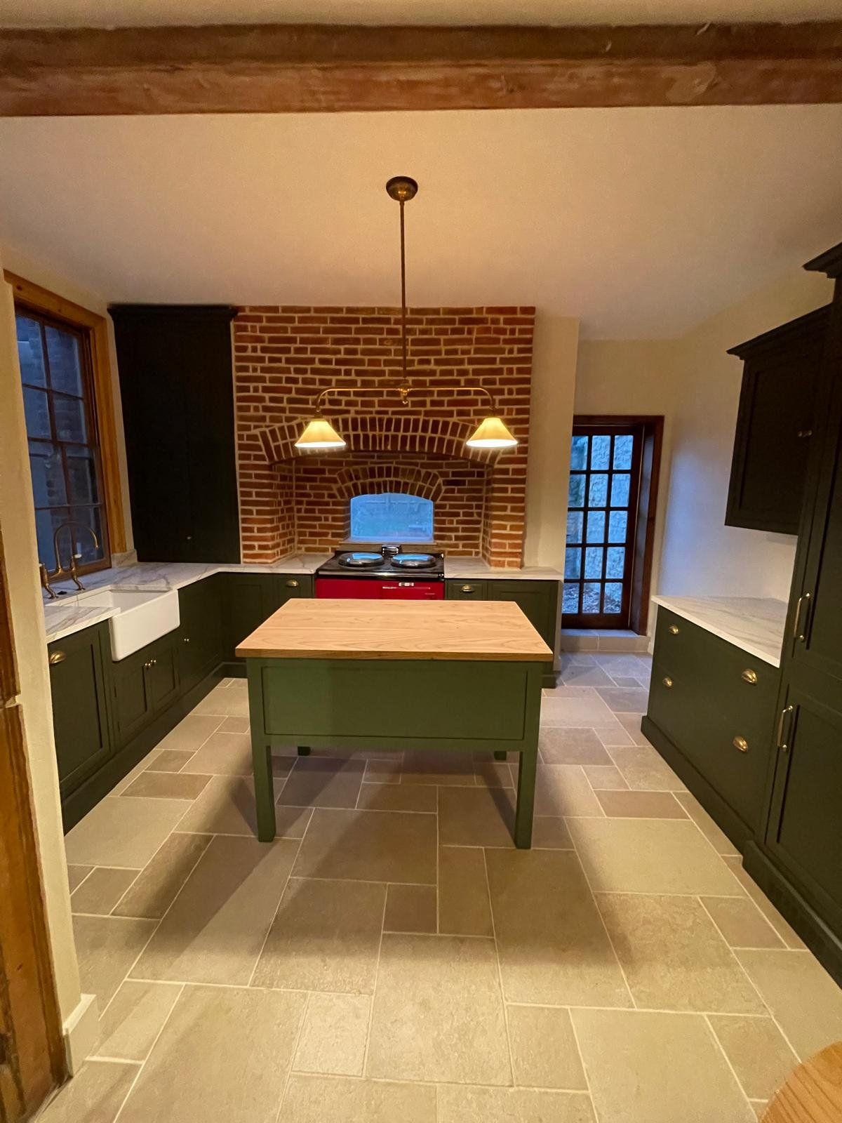 Green shaker kitchen fitted by Oxford Direct Builders