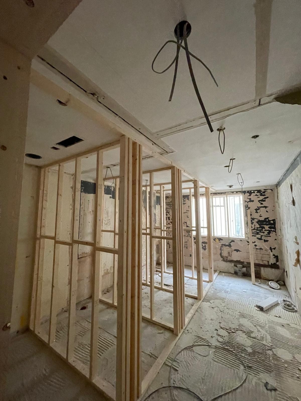 Timber stud wall framing for a new partition