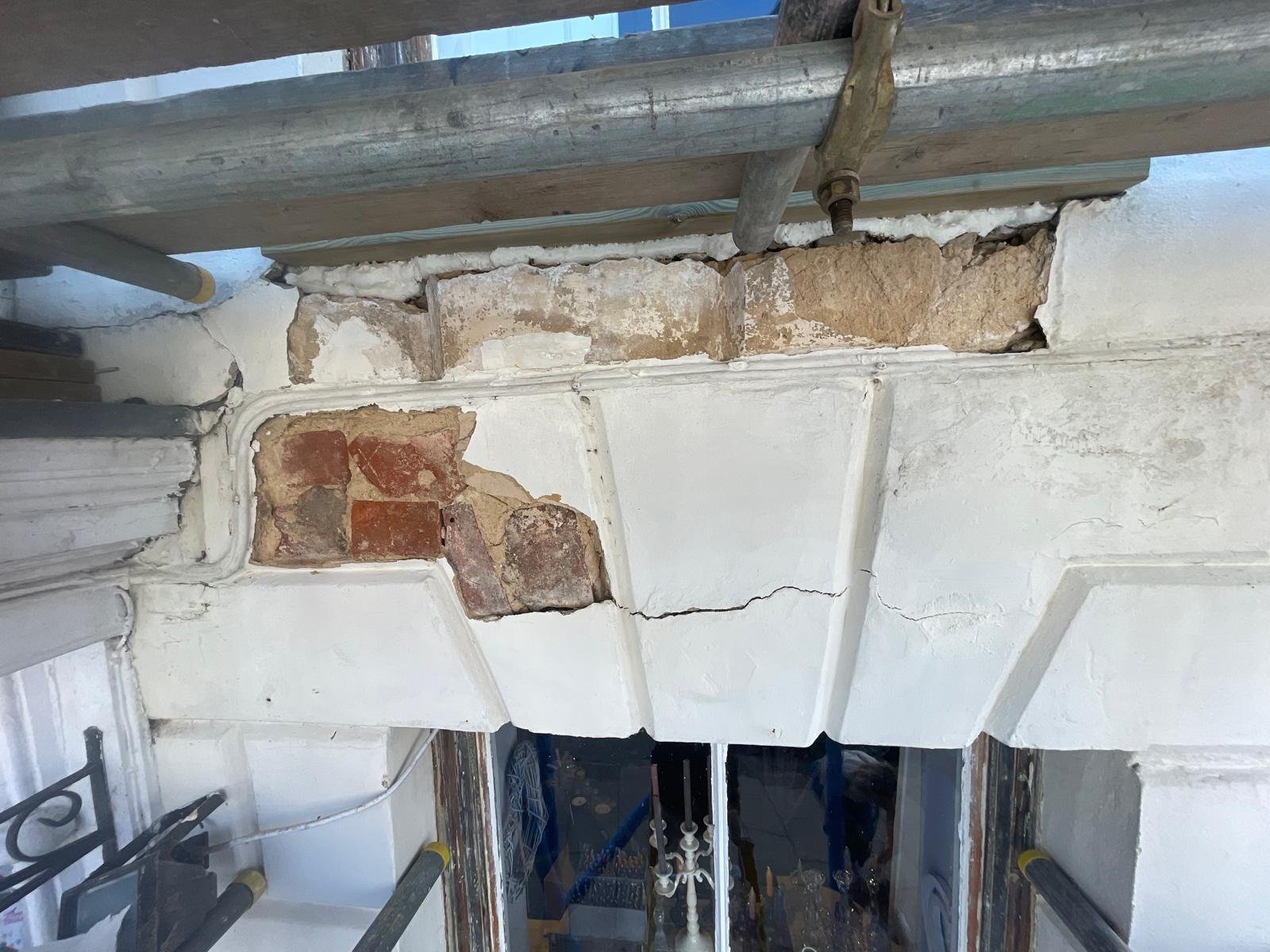 Period stone facade repair works with scaffolding in Oxford