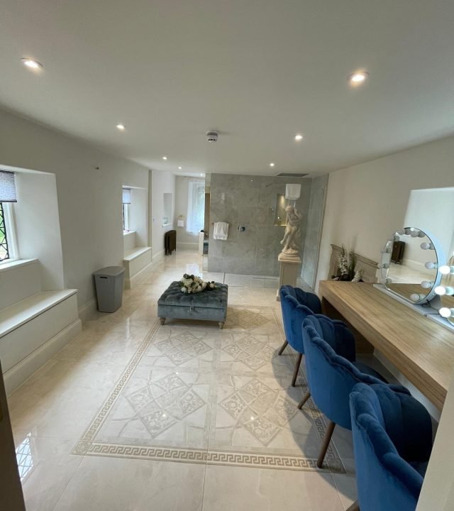 Elegant refurbished period-property hallway with marble floor by Oxford Direct Builders